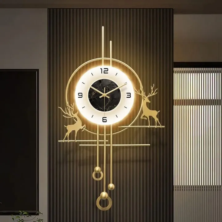 Horloge murale luxe dorée avec pendule suspendue
