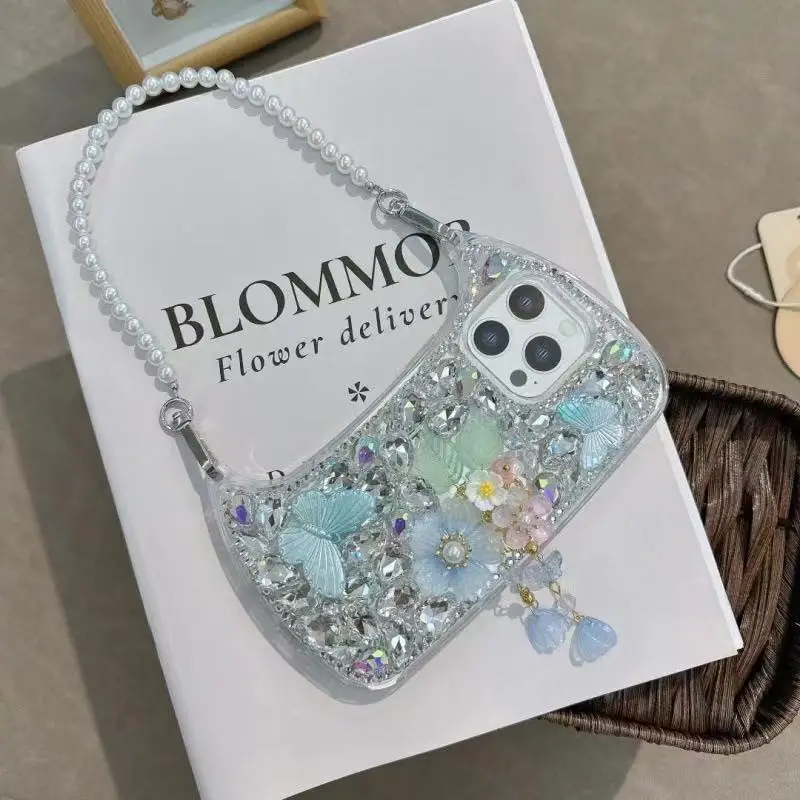 Coque iPhone 13/14/15/16/17 Pro Max Luxe Dragonne Diamant Strass Papillon Perle Fleur