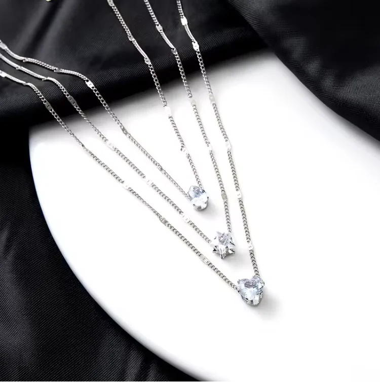 Collier multicouche femme plaqué or/argent – Pendentifs cœur, étoile & goutte | Strass élégant