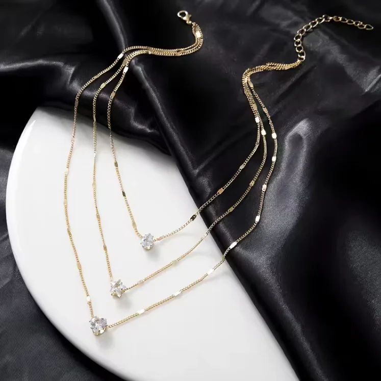 Collier multicouche femme plaqué or/argent – Pendentifs cœur, étoile & goutte | Strass élégant