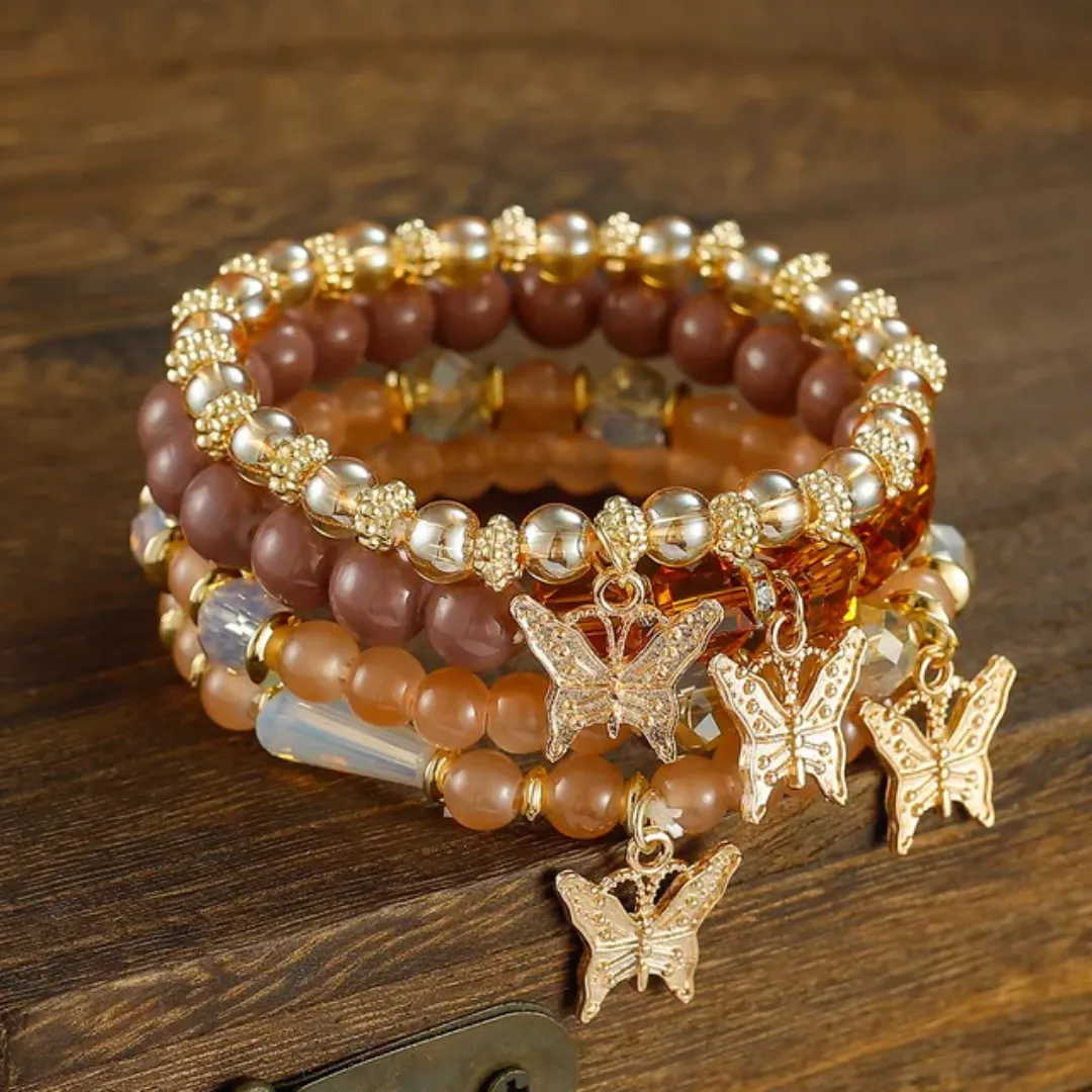 Lot de Bracelets Bohèmes Élégants – Perles et Breloques Papillon (4 pièces)